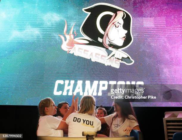 Members of Team Assassins celebrate defeating Team Dignitas during the CS:GO World Finals on Day Two of the Girl Gamer Esports Festival at Meydan...
