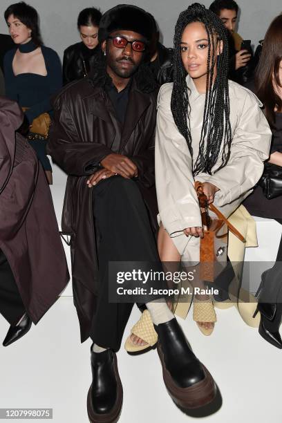 Dev Hynes and Tessa Thompson attend the Bottega Veneta fashion show during the Milano Fashion Week Fall / Winter 2020 - 2021 on February 22, 2020 in...