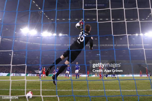 Marcel Sabitzer of RB Leipzig scores his team's first goal as Alexander Nuebel of FC Schalke 04 makes a mistake during the Bundesliga match between...