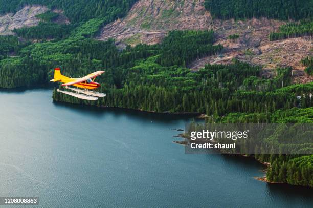 flying over alaska - seaplane stock pictures, royalty-free photos & images