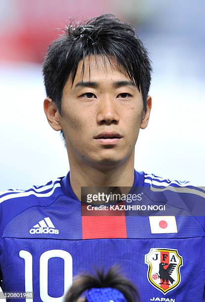 Shinji Kagawa, a member of Japan national football team, poses at a photo session prior to a friendly match against South Korea in Sapporo, Hokkaido...