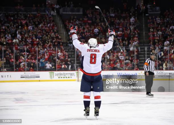 Alex Ovechkin of the Washington Capitals celebrates his goal at 4:50 of the third period against the New Jersey Devils at the Prudential Center on...