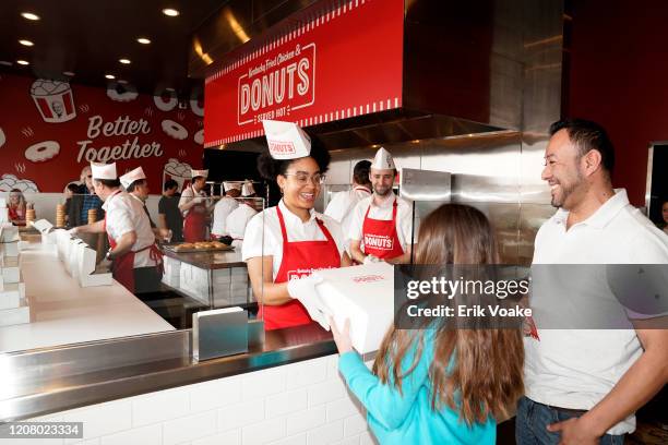 The first 50 guests in line received a Colonel’s Dozen, exclusive to The Colonel’s Donuts Shop, complete with six glazed-to-order donuts and six KFC...