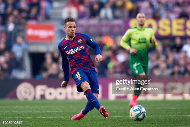 Arthur Melo of FC Barcelona plays the ball during the La Liga match between FC Barcelona and SD Eibar SAD at Camp Nou on February 22, 2020 in...