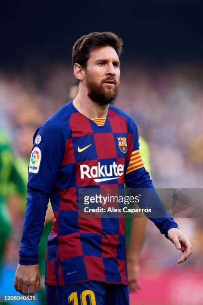 Lionel Messi of FC Barcelona looks on during the La Liga match between FC Barcelona and SD Eibar SAD at Camp Nou on February 22, 2020 in Barcelona,...