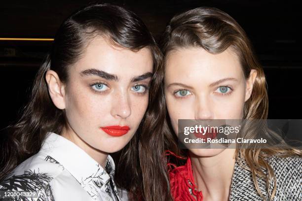 Model Alisha Nesvat and Lindsey Wixson are seen backstage at the MSGM fashion show on February 22, 2020 in Milan, Italy.