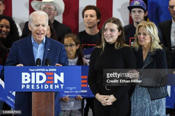 Democratic presidential candidate former Vice President Joe Biden speaks as his granddaughter Finnegan Biden and wife Dr. Jill Biden look on during a...