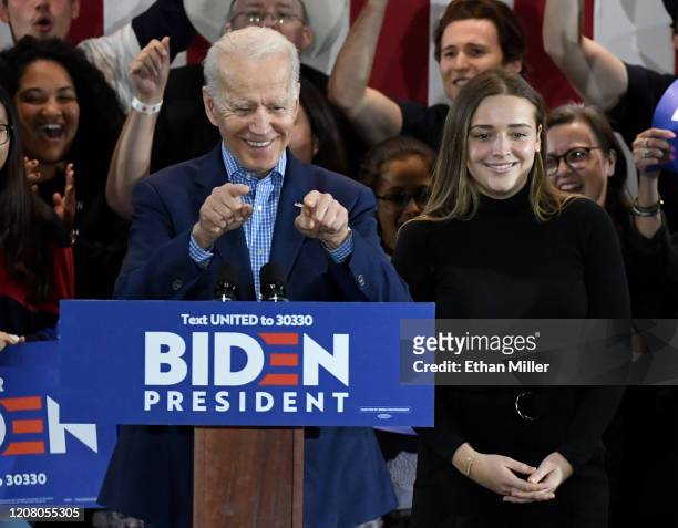 Democratic presidential candidate former Vice President Joe Biden and his granddaughter Finnegan Biden are greeted as they arrive at a Nevada caucus...