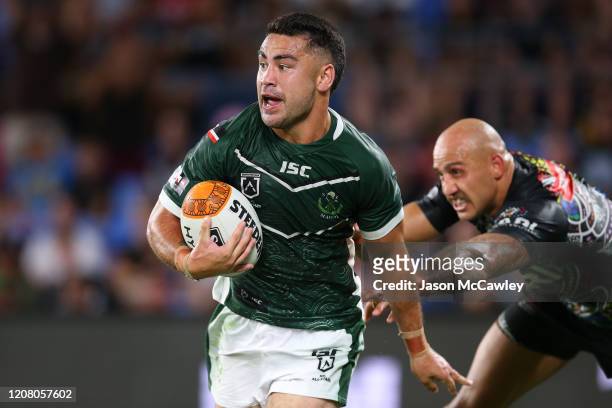 Jahrome Hughes of the Maori All-Stars runs with the ball during the NRL match between the Indigenous All-Stars and the New Zealand Maori Kiwis...