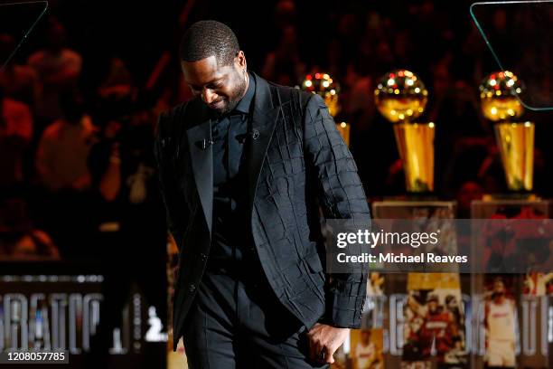 Former Miami Heat player Dwyane Wade reacts during his jersey retirement ceremony at American Airlines Arena on February 22, 2020 in Miami, Florida....