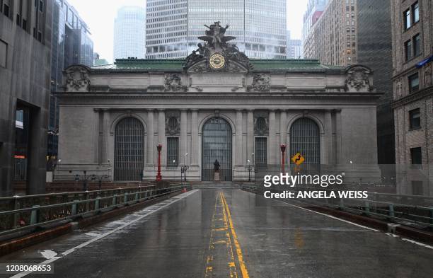 View of an empty street in front of Grand Central station on March 23, 2020 in New York City. - The Big Apple has the highest number of confirmed...