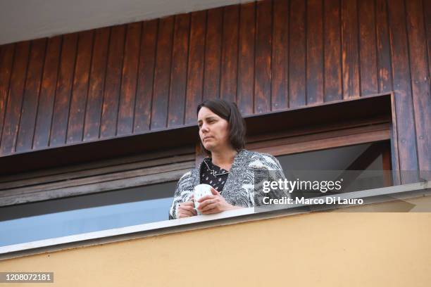 Woman has coffee on her home balcony on March 22, 2020 in Rome, Italy. As Italy extends its nationwide lockdown to control the spread of COVID-19,...