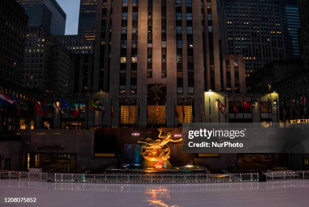 Desolate Rockefeller Center Plaza on Friday, March 2020 in New York, NY. The city officially announced the closure of all non-essential businesses...