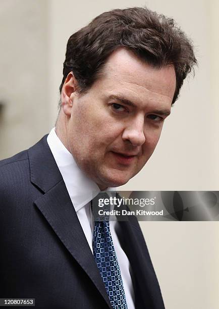 British Chancellor George Osborne leaves 10 Downing Street on August 11, 2011 in London, England. Parliament has been recalled following four days of...