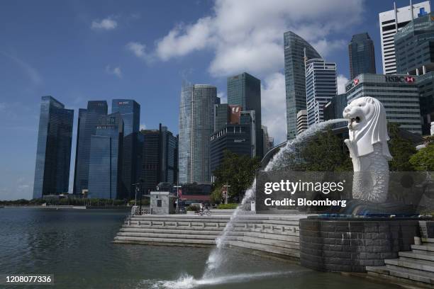 The Merlion Park waterfront stands empty in Singapore, on Tuesday, March 24, 2020. Singapore will deliver a supplementary budget and bring forward...