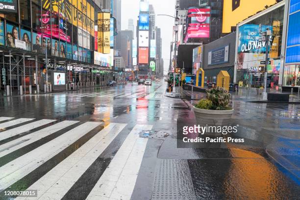 Virtually empty Times Square in Manhattan on first day of Stay at Home executive order.