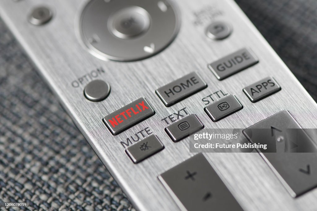 Close-up detail of the Netflix button on a television remote control ...