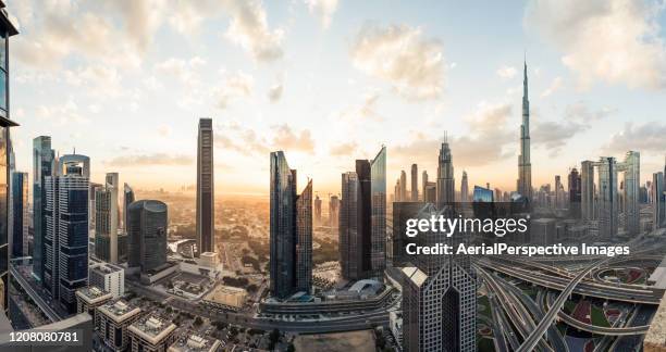 high angle view, panoramic view of dubai skyline at sunrise - downtown dubai stock pictures, royalty-free photos & images