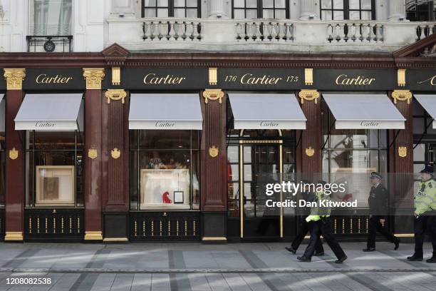 Commissioner of the Metropolitan Police Service Cressida Dick walks past a closed Cartier store as she takes part in a police patrol on New Bond...