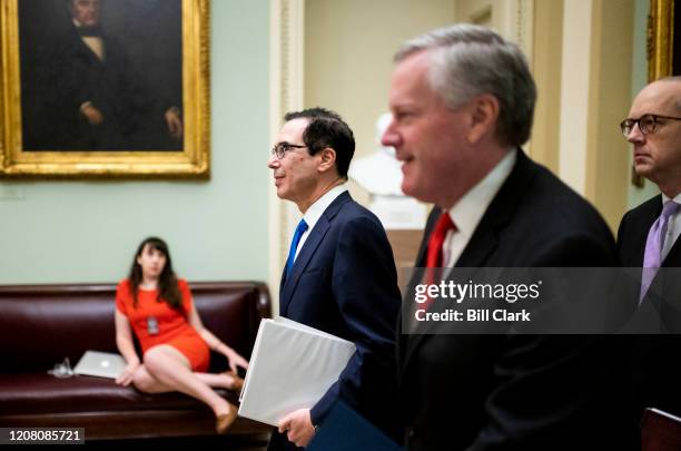 From left, Treasury Secretary Steven Mnuchin, incoming White House Chief of Staff Rep. Mark Meadows, R-N.C., and White House Legislative Affairs...