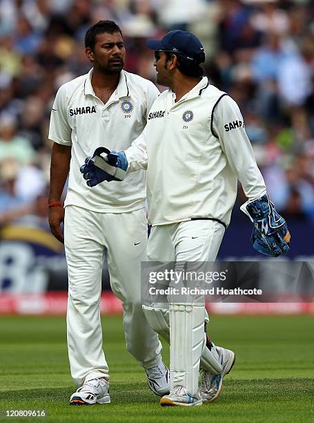 Praveen Kumar and MS Dhoni of India have words during day two of the 3rd npower Test at Edgbaston on August 11, 2011 in Birmingham, England.