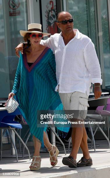 Spanish journalist Ana Rosa Quintana and her husband Juan Munoz are seen sighting on August 10, 2011 in Ibiza, Spain.