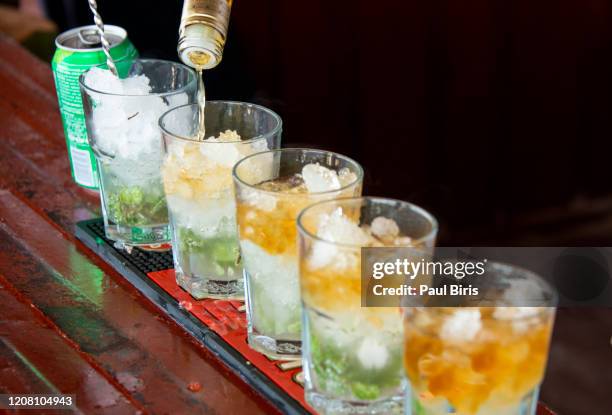 mojito cocktail with lime and mint in glass - rum tasting stock pictures, royalty-free photos & images