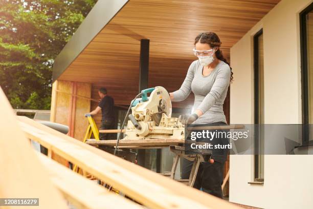 circular saw trimboard - safety glasses at home stock pictures, royalty-free photos & images