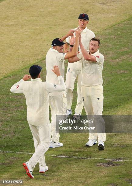Ollie E Robinson of the England Lions celebrates after dismissing Moises Henriques of Australia A during the Four Day match between Australia A and...