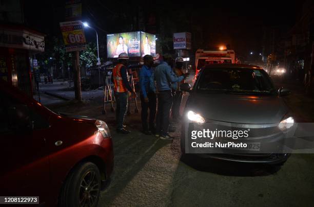 Police personnel checks the car after the central governments announcement of nationwide 21 day lockdown in Kolkata, India on Tuesday , 24th March ,...