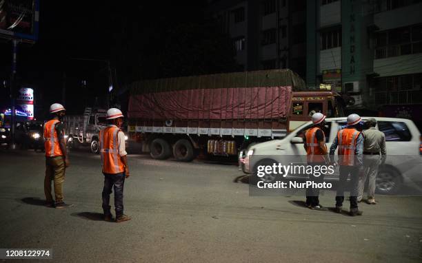 Police personnel checks the car after the central governments announcement of nationwide 21 day lockdown in Kolkata, India on Tuesday , 24th March ,...