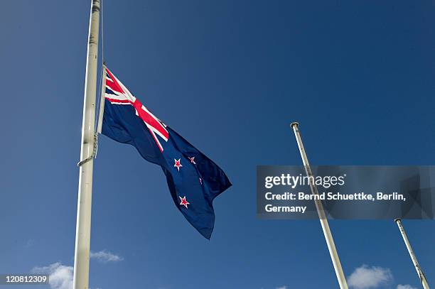 new zealand flag - half mast stock pictures, royalty-free photos & images