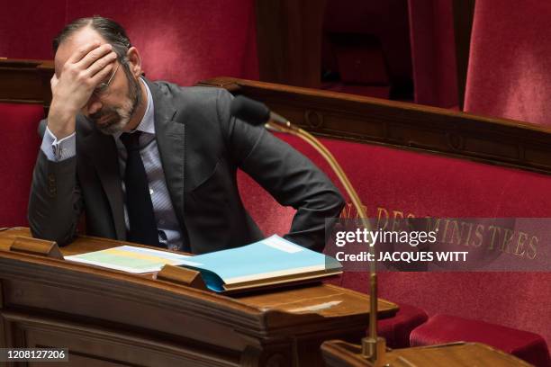 French Prime Minister Edouard Philippe gestures during the weekly session of questions to the government at the National Assembly in Paris, on March...