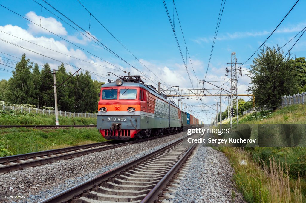 Powerful electric locomotive with short container train