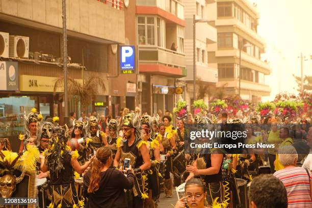 Parades of 'Carnaval al Sol' at Las Canteras Beach during a sandstorm on February 22, 2020 in Las Palmas De Gran Canaria, Spain.