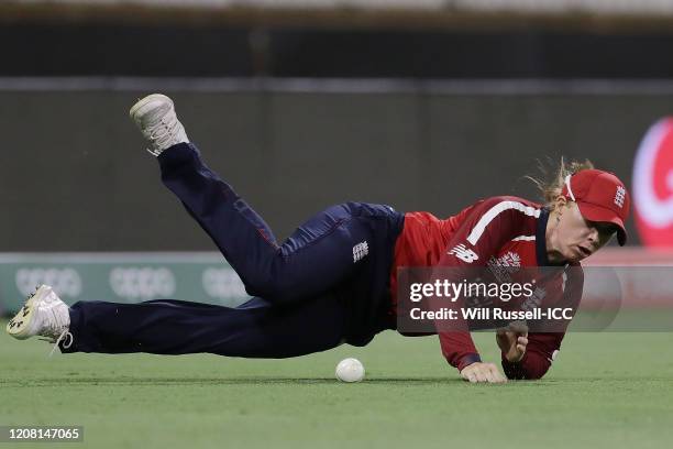 Lauren Winfield of England drops a catch off Chloe Tryon of South Africa during the ICC Women's T20 Cricket World Cup match between England and South...