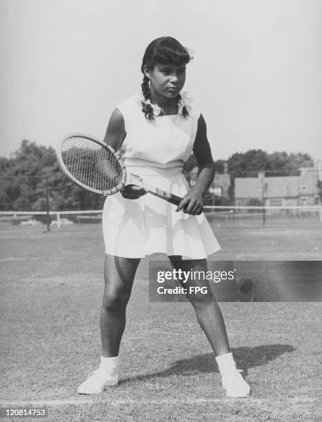 Fourteen year-old African-American tennis player Lorraine Williams on a court in Philadelphia, USA, 1953.