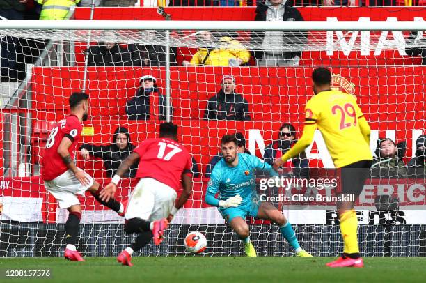 Bruno Fernandes of Manchester United scores his teams first goal from a penalty during the Premier League match between Manchester United and Watford...