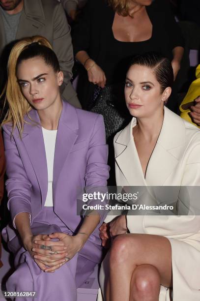 Cara Delevingne and Ashley Benson attend the Boss fashion show on February 23, 2020 in Milan, Italy.
