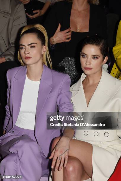 Cara Delevingne and Ashley Benson attend the Boss fashion show on February 23, 2020 in Milan, Italy.
