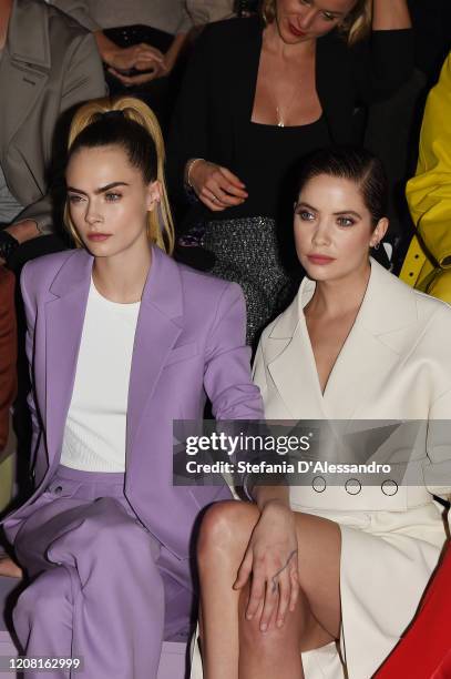 Cara Delevingne and Ashley Benson attend the Boss fashion show on February 23, 2020 in Milan, Italy.