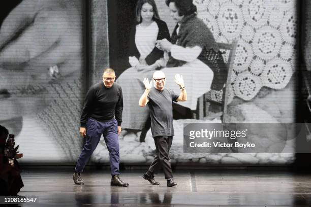 Fashion designers Domenico Dolce and Stefano Gabbana acknowledge the applause of the audience during the Dolce e Gabbana fashion show as part of...