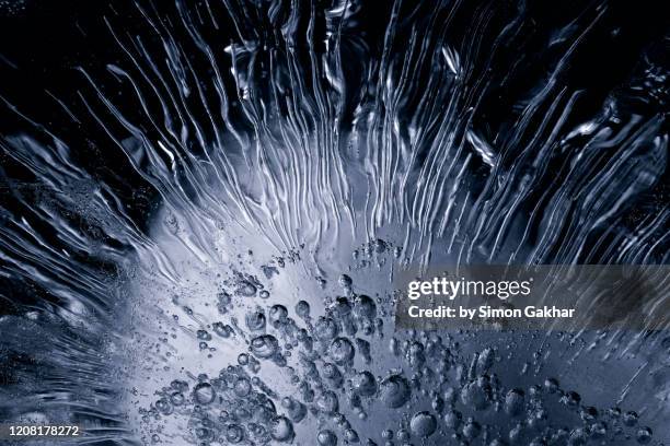 extreme close up of ice - macro fotografías e imágenes de stock