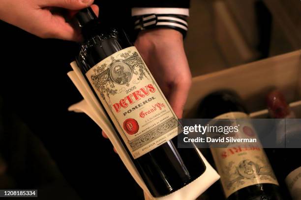 January 30: Adar Bershadsky, head of wine and sommelier at The Jaffa Hotel, holds a bottle of French Bordeaux wine Château Pétrus 2005, the most...