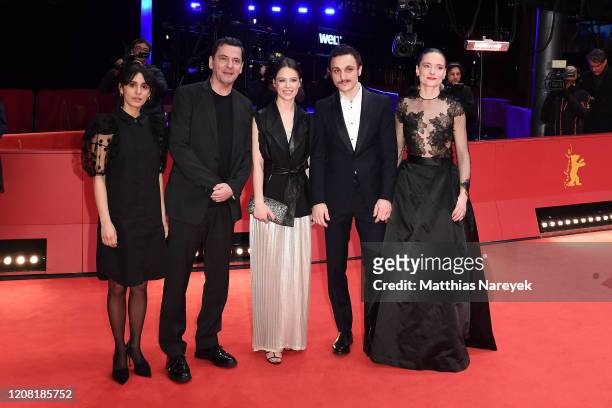 Maryam Zaree, director Christian Petzold, Paula Beer, Franz Rogowski and Anne Ratte-Polle pose at the "Undine" premiere during the 70th Berlinale...