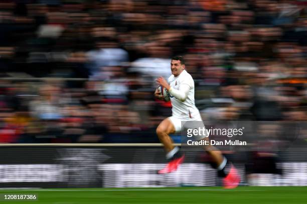 Jonny May of England makes a break during the 2020 Guinness Six Nations match between England and Ireland at Twickenham Stadium on February 23, 2020...