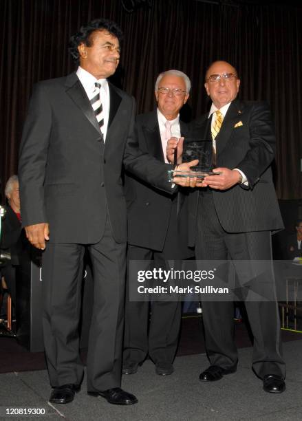 Johnny Mathis receives the 15th Annual Ella Award from Jerry F. Sharell and Clive Davis