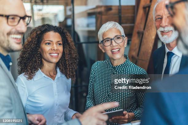 business discussion - mixed age range stock pictures, royalty-free photos & images