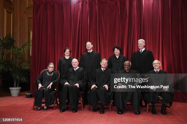 Seated from left, Associate Justice Ruth Bader Ginsburg, Associate Justice Anthony M. Kennedy, Chief Justice of the United States John G. Roberts,...