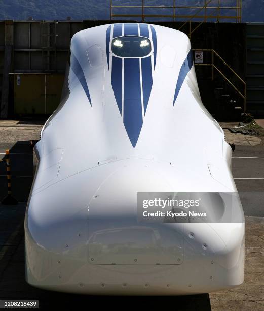 Prototype of an upgraded Central Japan Railway Co. Maglev train is unveiled to the media at Hitachi Ltd.'s factory in Kudamatsu, Yamaguchi...